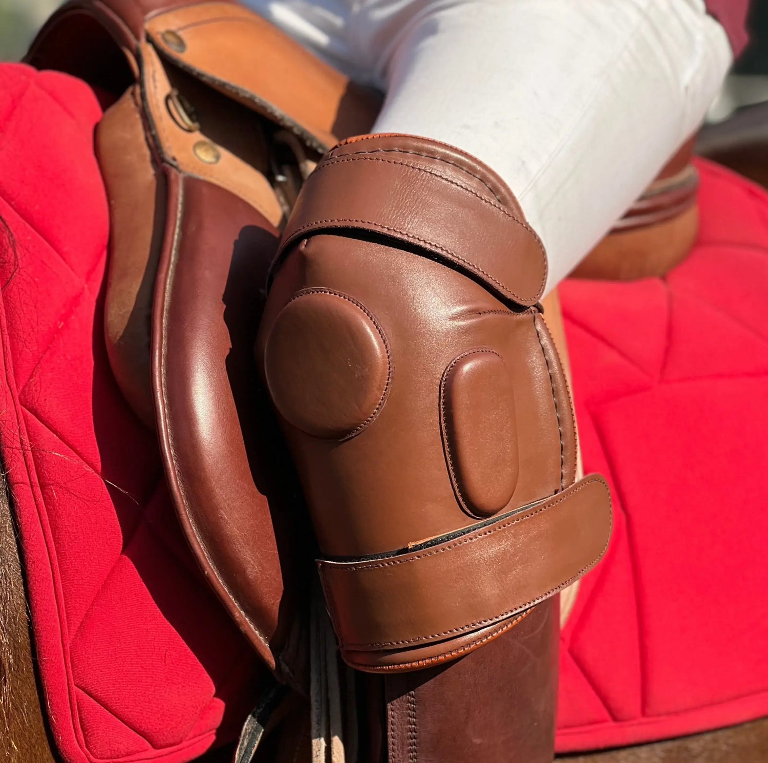 Polo Renoir polo knee guards in brown premium padded leather with three adjustable Velcro straps